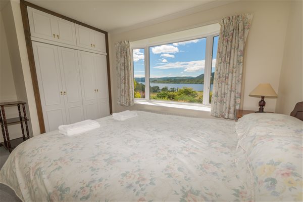 holiday cottage bedroom with view over Loch Awe